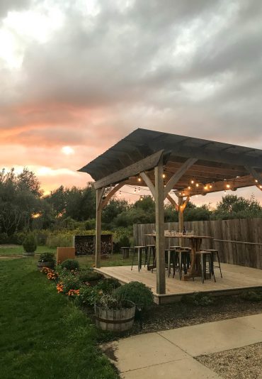 Virtue Cider's outdoor seating area for cider and wine tasting - in Fennville, MI (near Saugatuck and Douglas).